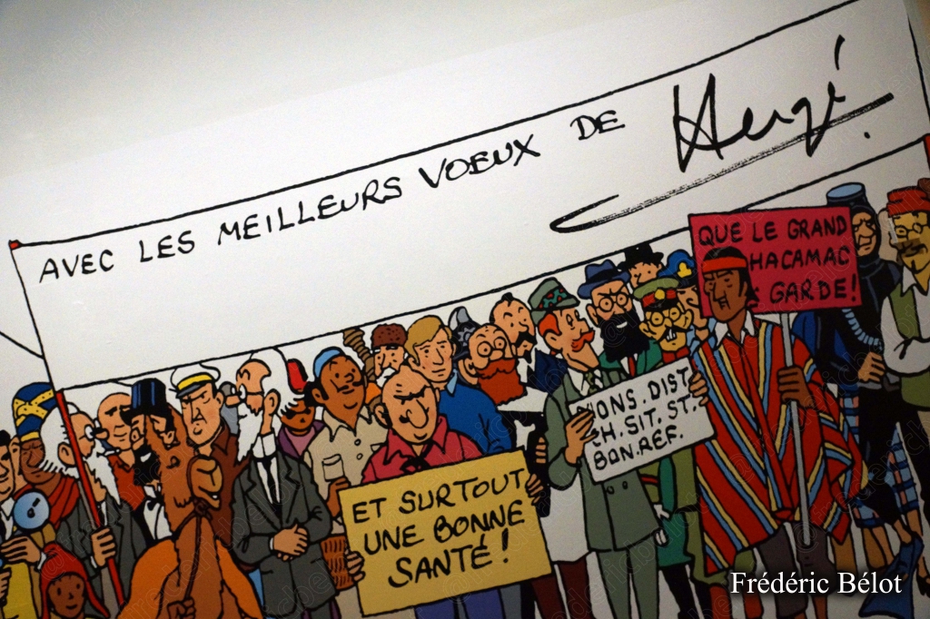 Une fresque murale représentant une foule de personnages de Tintin réunis.